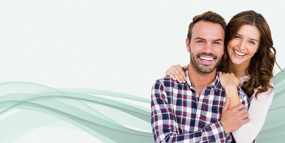 Man and Woman Smiling with Bright White Teeth